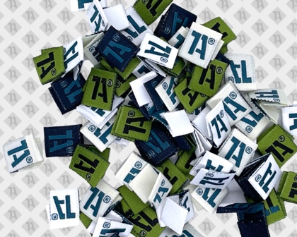 Label gewebt Loop Fold grün blau weiß schwarz 1A Laserschnitt