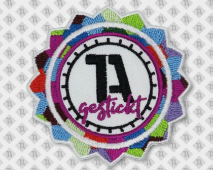 Komplexer, gestickter Patch mit 10 verschiedenen Farben und farbigen Rand mit Motiv ders 1A-Logos