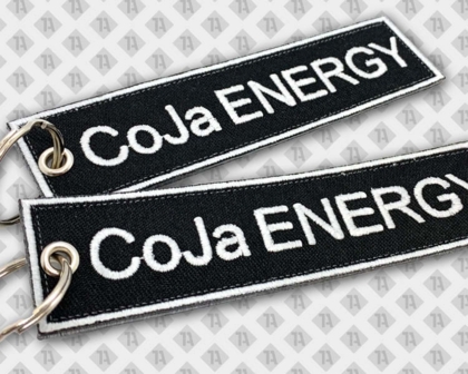 Schlüsselanhänger gestickt eckig mit mit Ringöse und Ring mit gesticktem Rand schwarz weiß Energy Firmen