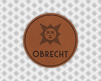Rundes Patch Aufnäher Leder Badge geprägt zum Aufnähen Obrecht mit Nährand Firmen