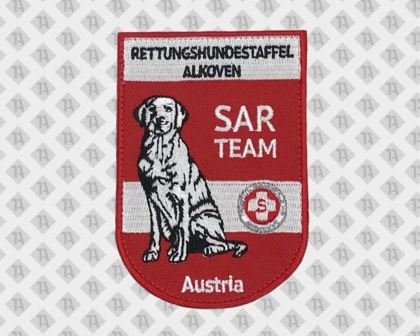 Konturgeschnittener Patch Aufnäher gestickt mit Kettelrand Wappen Rettungshunde rot weiß Austria Hundesport