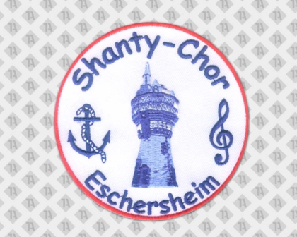Runder Patch „Shanty-Chor Eschersheim“ mit gesticktem Rand, Turm-Motiv, Anker und Notenschlüssel.