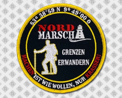 Runder gestickter Aufnäher Patch mit Kettelrand schwarz gelb rot Nord Marsch Genzen erwandern Backpacker