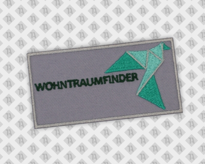 Eckiger Patch Aufnäher Badge gestickt mit gesticktem Rand Wohntraumfinder Vereine