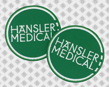 Runder Patch Aufnäher gestickt mit gesticktem Rand grün weiß Hänsler Medical Firmen