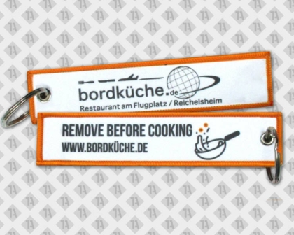 Schlüsselanhänger gedruckt mit Kettelrand Remove before cooking bunt