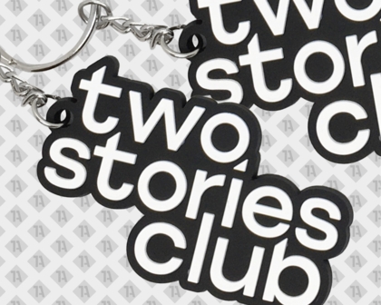 PVC Rubber Schlüsselanhänger Kontur two stories club schwarz weiß mit Kette Öse Ring