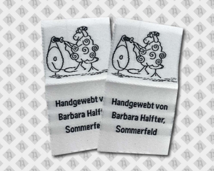 Label gewebt mit Laserschnitt schwarz weiß Schaf Handgewebt chriftzug