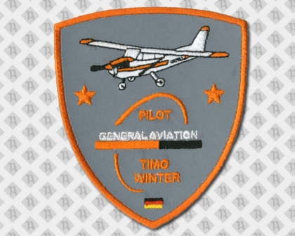 Patch Aufnäher gestickt in Wappenform reflektierender Hintergrund orange Flugzeug Firmen