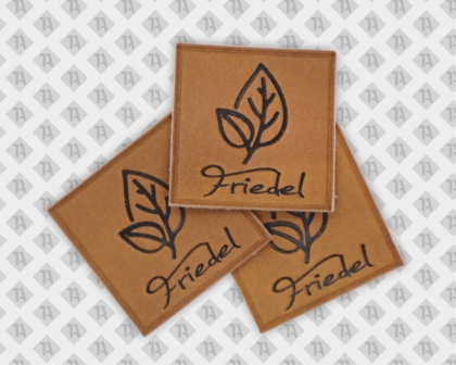 Eckiger Echtleder Aufnäher Patch Badge geprägt und gedruckt mit Nährand Gartenbau Friedel Firmen
