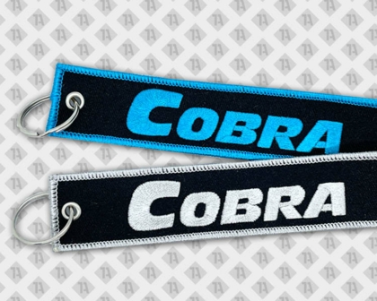 Gestickter Schlüsselanhänger Kettelrand weiß blau Cobra Biker