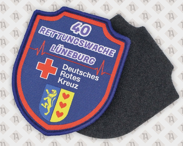 Patch Aufnäher gewebt mit Kettelrand Konturschnitt und Klettfläche Rettugnsdienst Deutsches Rotes Kreuz