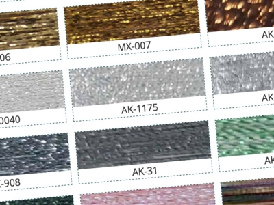 Farbmuster einiger Metallic-Webgarne die als Palette dargestellt sind